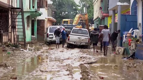 Deadly floods in Haiti inundate homes and streets