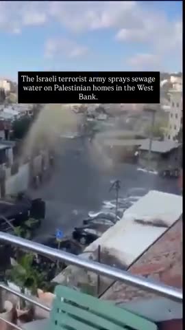 The Israeli army sprays sewage water on Palestinian homes in the West Bank
