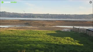 Foggy over the water with sun on the way