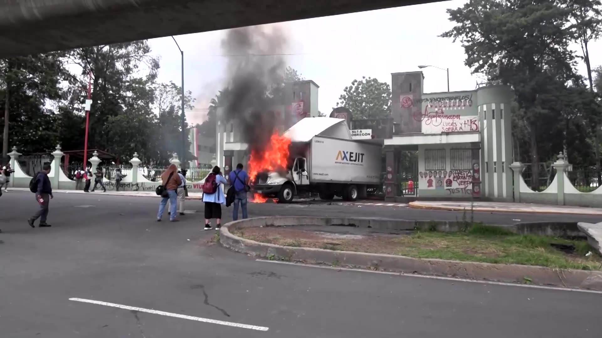 Protesters torch truck at Mexico army camp over missing students