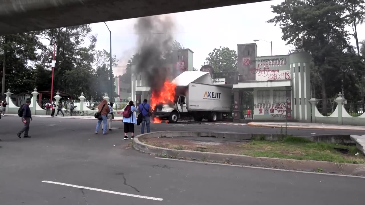 Protesters torch truck at Mexico army camp over missing students