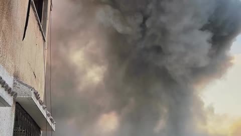 Palestinian artist, Amir Hellis, captures the moment Israeli forces carry out a massive airstrike