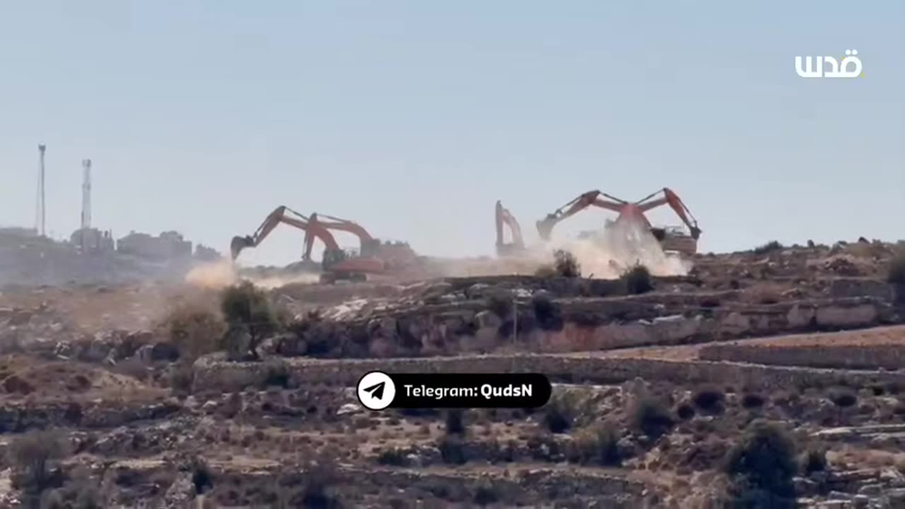 Israeli bulldozers are flattening Palestinian land east of Hebron in the southern West Bank