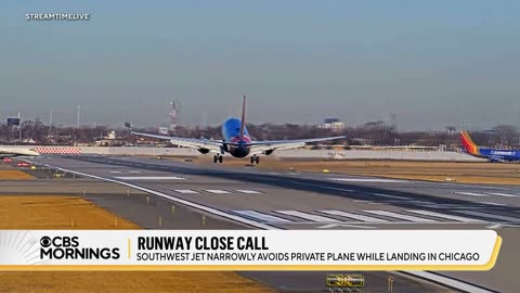 Gayle King : Video shows close call between plane, business jet at Chicago airport