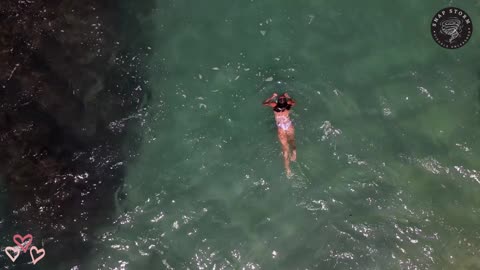 Sexy Girl Swimming in the ocean wearing just a panty