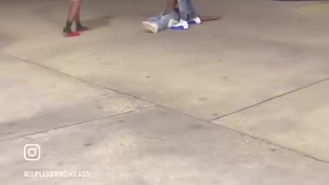 Black men come to aid unconscious black man