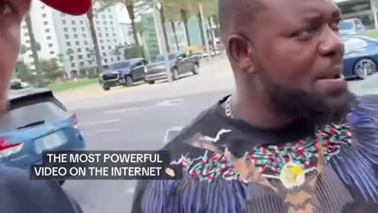 Immigrant from Africa argues with protesters