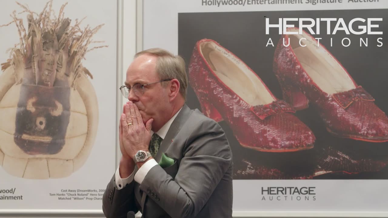 Wizard of Oz Ruby Red Slippers sold at Heritage Auctions.. Tom Hanks Wilson volley ball !