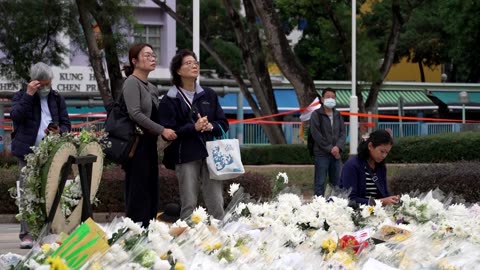 Hong Kong fire survivors allowed brief return to collect belongings