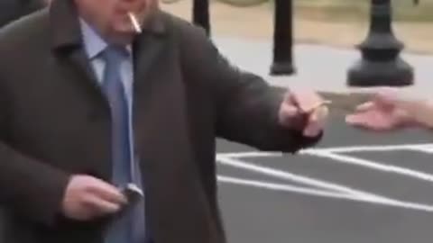 Danish Foreign Minister Lars Løkke Rasmussen calming down with a cigarette