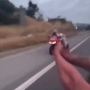 Man fires shots at motorcycle rider