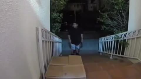 guy catches thief trying to steal a package off his porch