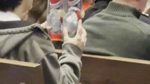 Elves In Held Tubes Watch Christmas Performance