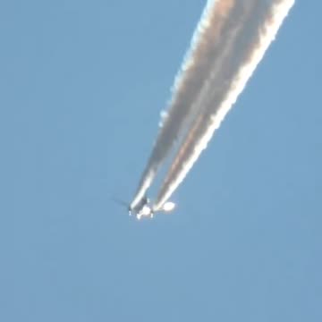 Nikon p1000 zooms in on a chemtrail plane laying dust 31 miles away.