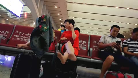 Mature lady sits freely...