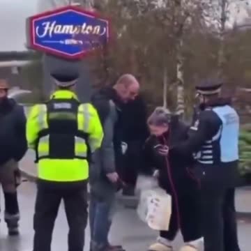 A British man dressed in a full burqa and walked past police officers to prove his claims of a ...