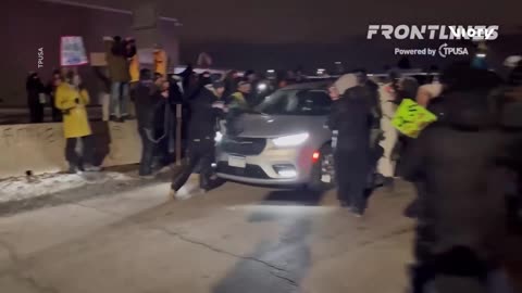 Police deploy tear gas outside Henry Whipple Building as protesters protest a second shooting by ICE