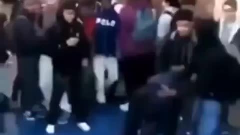 Bully gets knocked out, students cheer and laugh. Instant Karma
