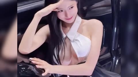 Watch sexy model next to luxury cars