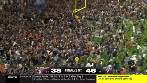 Virginia Cavaliers fans quickly storm Scott Stadium field after beating Florida State Seminoles