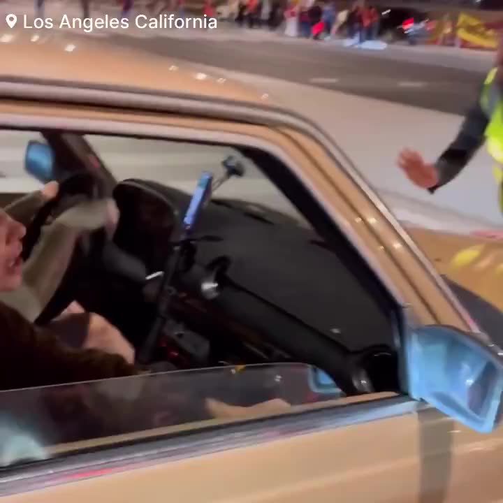 LAPD are in gear as hundreds of airline catering workers are protesting outside LAX
