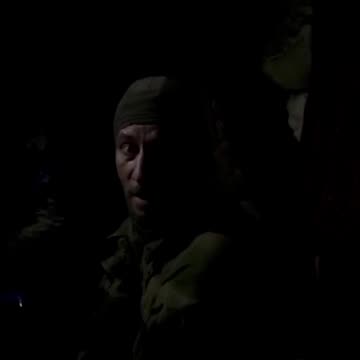 Medics Examine Wounded Russian Soldier