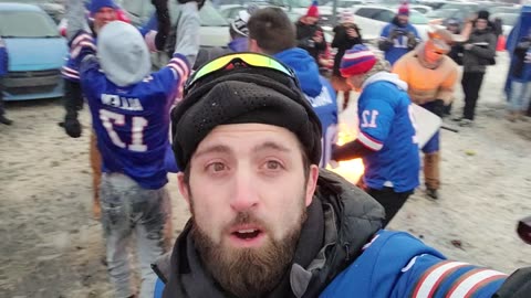 Buffalo Bills Fan Jumps Thru a Flaming Table and Catches Fire