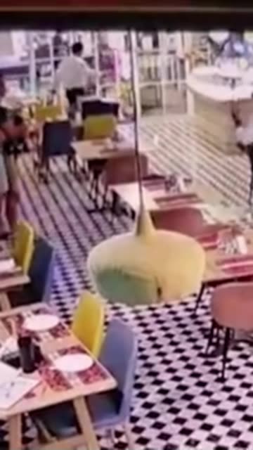 Australian tourist killed after running into restaurant glass doo