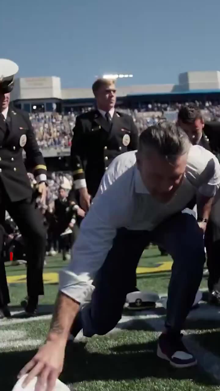 Secretary of War Pete Hegseth helps set a world record at the Navy football game