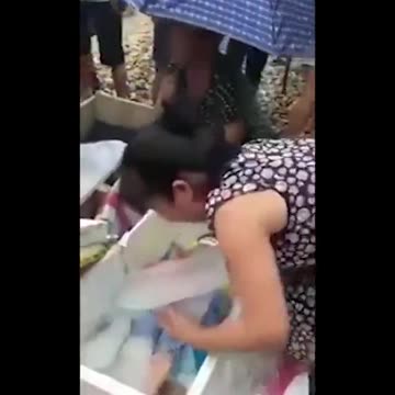 Frozen Children In Boxes - China