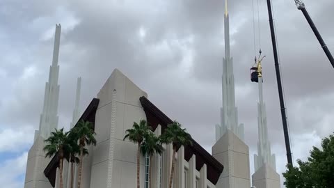 Temple statue back in place