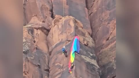 🚁 Helicopter's Incredible Rescue of BASE Jumper Dangling From Canyon Wall