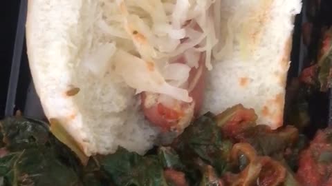 Hot Dog With Spinach Whipped Up in Tomato Sauce. All Good!