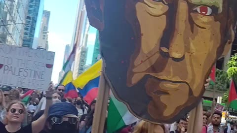 New Yorkers marching: "ARREST NETANYAHU. STOP THE GENOCIDE."