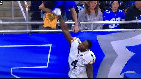 Steelers WR #4 D.K. Metcalf punches at a fan in Detroit