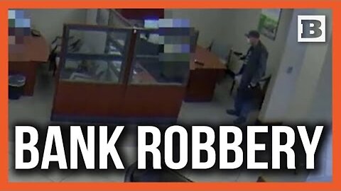 Police Searching for Robber Who Allegedly Pointed Firearm at Bank Employee