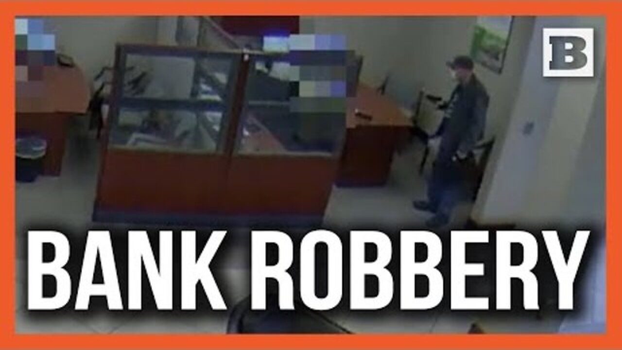 Police Searching for Robber Who Allegedly Pointed Firearm at Bank Employee