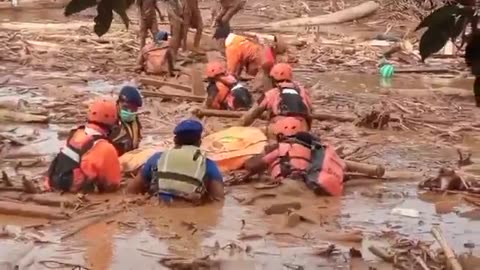 The death toll from the floods and landslides in Indonesia has risen to 303.