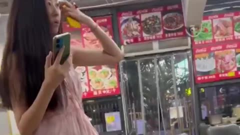 Chinese Girl tells Negro to go home.