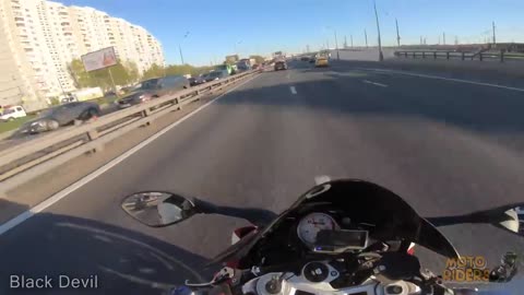 Chasing a sports motorcycle on three motorboats