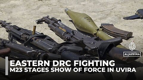 M23 rebels display seized arms in the captured DRC city of Uvira