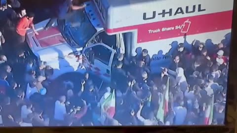 footage of the aftermath after person drove U-Haul truck into Iranian protests