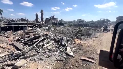 Hamas hands over hostage bodies after Israel threatens aid cut