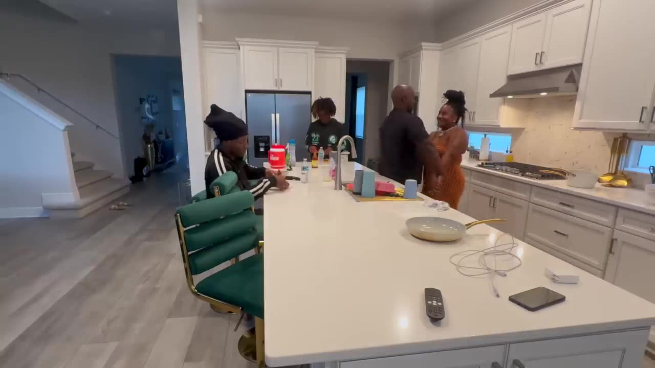 BEING OVERLY CLINGY IN FRONT OF THE KIDS TO GET THEIR REACTION