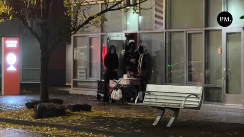 Antifa militants transport supplies into the apartment unit being used as a safehouse