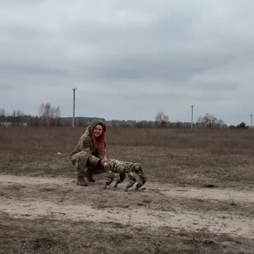 Cute Female Soldier and Her Dog