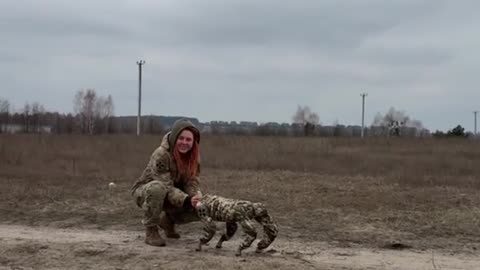 Cute Female Soldier and Her Dog