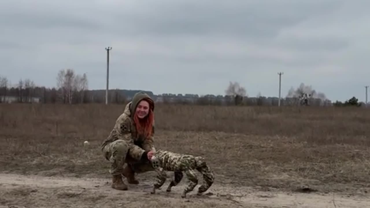 Cute Female Soldier and Her Dog