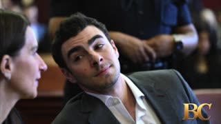 Luigi Mangione smiles for cameras in court as defense claims police violated his rights