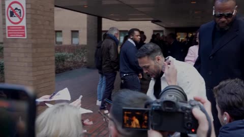 Chris Brown appears at London court ahead of October assault trial